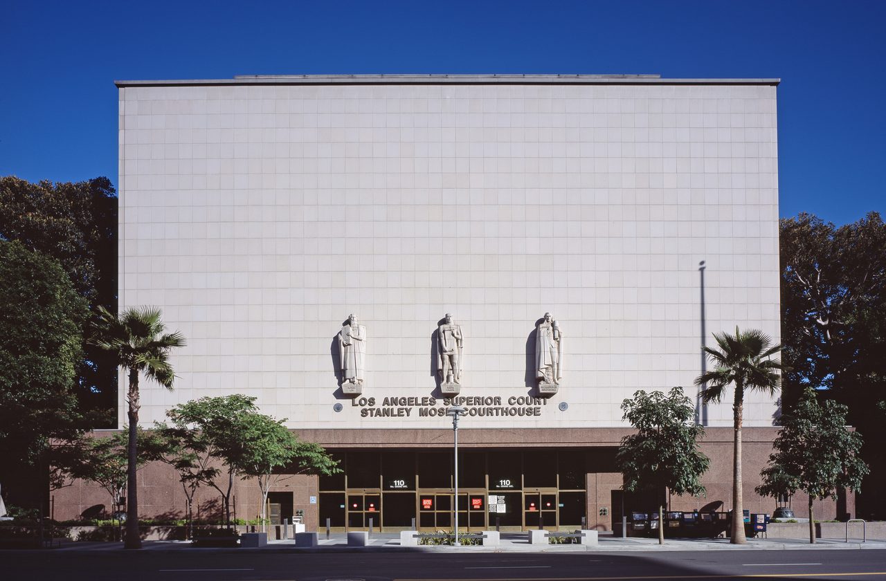Grand Avenue entrance of the Stanley Mosk Courthouse of the Los Angeles Superior Court in downtown Los Angeles, with relief statues above the doors