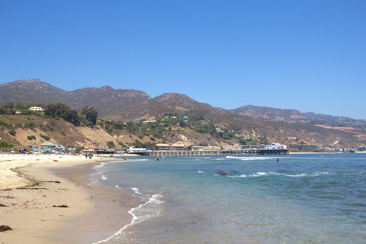 Malibu beach and pier with the Santa Monica Mountains behind, California