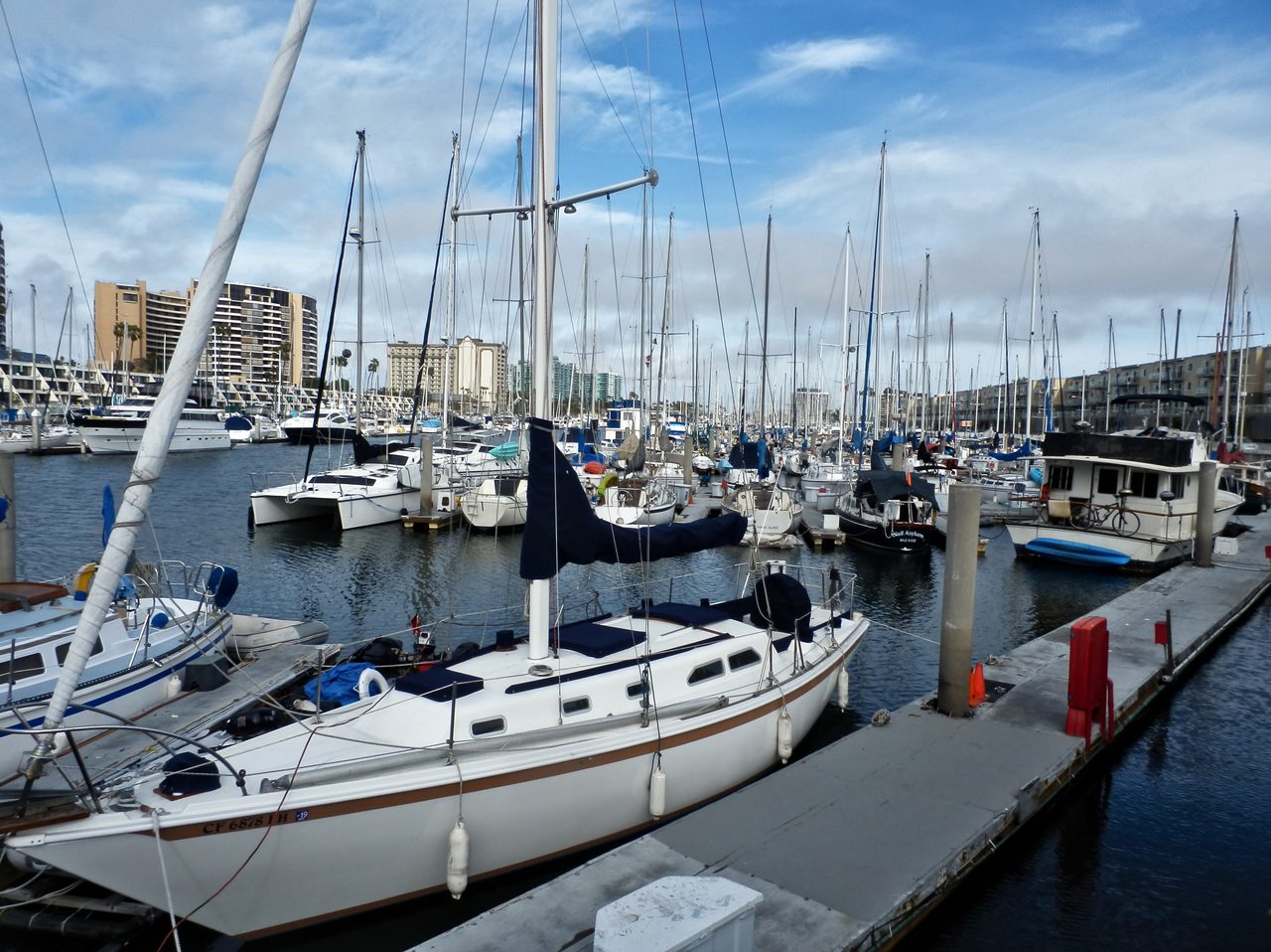 Sailboats docked in a boat slip at Marina del Rey, California